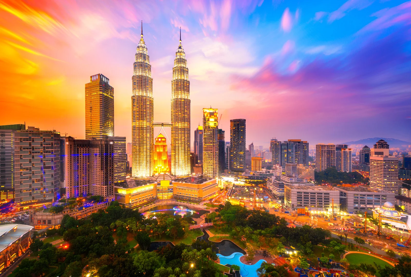 Petronas Twin Towers and Kuala Lumpur skyline at sunset